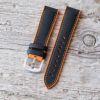 black and orange rubber watch strap